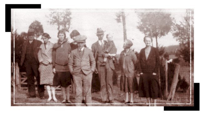 A RUSSELL-SANDERS FAMILY PHOTO:CIRCA 1927 in front of 'My Home In Alabama'